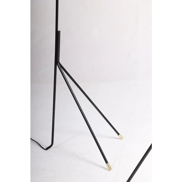 Great looking floor lamps in black painted metal and brass. Designed and made by S. A. Holm Sørensen in the mid-1950s....