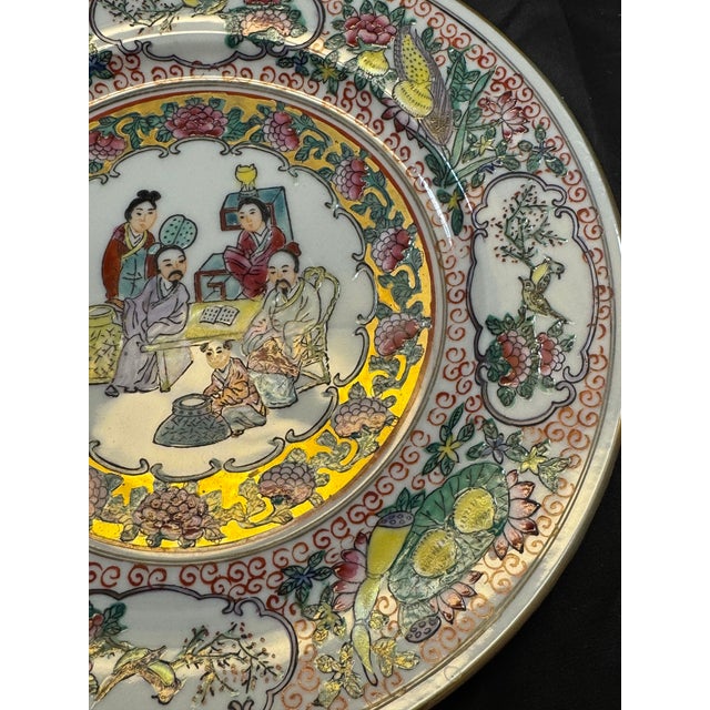 This set of 2 vintage Chinese Famille Rose dinner plates measures 10.25 inches in diameter and features traditional hand-...