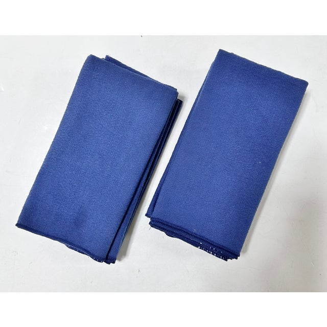 Set of eight classic blue cloth napkins, perfect for everyday dining, casual entertaining, or layering into a coordinated...