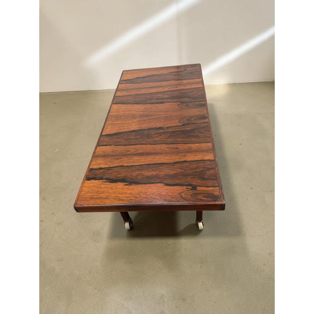 Wood Scandinavian Indonesian Rosewood Coffee Table on Wheels with Magazine Rack, 1960s For Sale - Image 7 of 10