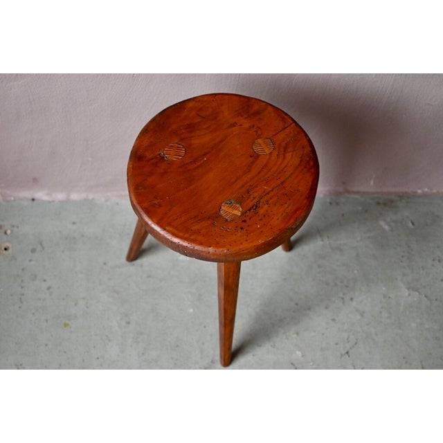 A thick seat supported by a minimalist, rustic base, this farmhouse stool appeals to us with its simplicity and authentic...