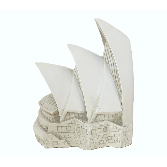 FREE SHIPPING ANYWHERE IN THE CONTINENTAL US! This is a vintage Sydney Opera House (Australia) white sculptural bookend....