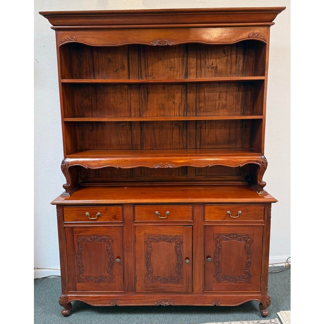 Design Plus Gallery presents a Vintage Sideboard with Regency Style. The sideboard a two piece with the upper cabinet have...