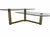 Vintage Postmodern 1970's Brass and Glass 2-Tier "L" Shaped Coffee Table Measurements: 18"h X 48"w X 48"d An eye-catching...