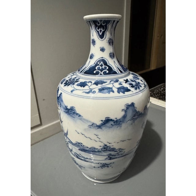 Enhance your collection with this **Vintage Mid-Century Modern Chinese Blue & White Porcelain Vase**, an elegant...