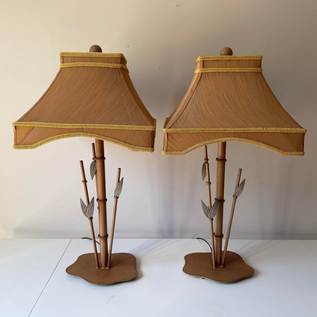 Vintage pair of steel bamboo stalk table lamps with custom silk and brocade pagoda lamp shades. The lamps are in excellent...