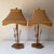 Vintage pair of steel bamboo stalk table lamps with custom silk and brocade pagoda lamp shades. The lamps are in excellent...