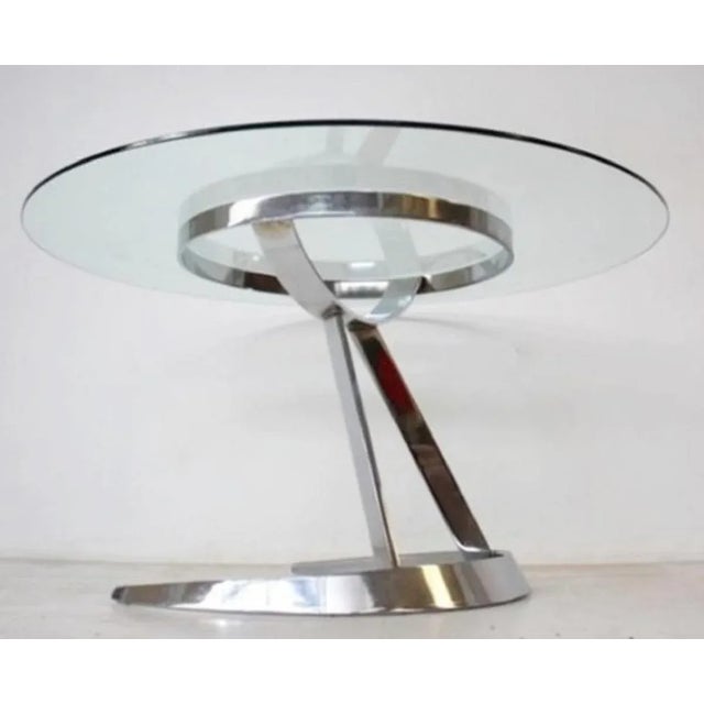 Space Age model scimitar dining table by Boris Tabacoff for Mobilier Modular Moderne, 1970s. This piece is attributed to...