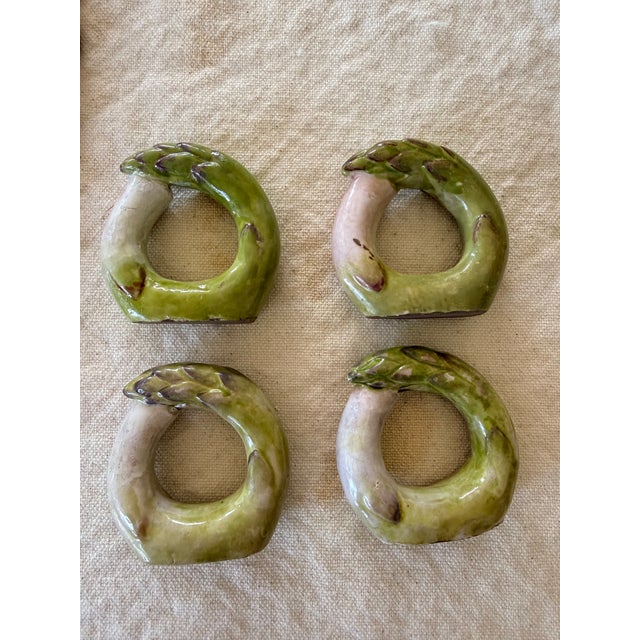 Bring a touch of whimsy to your table with this set of vintage ceramic asparagus napkin rings. Each ring is hand painted...