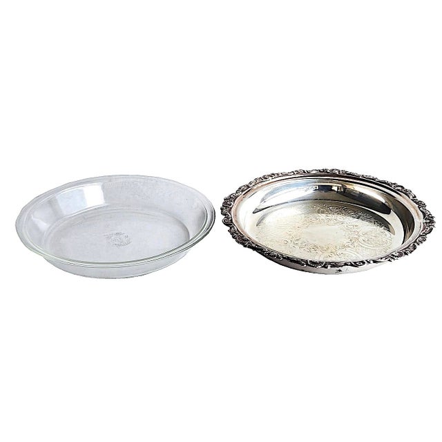 Offered is a classic silver plated pie serving platter made by Sheridan Silver Company in the early 1970s and a Pyrex...
