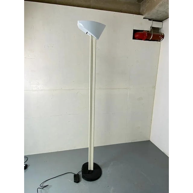 Very rare Memphis style floor lamp Mod. Otello, Designer Bruno Gecchelin for Oluce 1980. Born from the collaboration of...