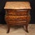 A pair of French bedside tables dating from the second half of the 20th century. These Louis XV-style pieces feature...