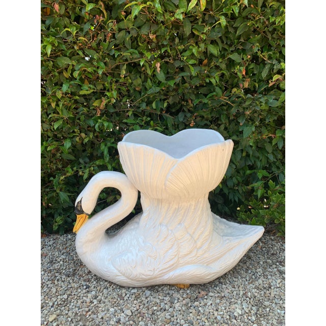 A monumental terra cotta swan from Italy. The piece is a wonderful addition to the garden or lanai. Made of dense material...
