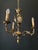 A magnificent antique chandelier. Italy, early 20th century. The chandelier is made of brass and bronze. Impeccable...