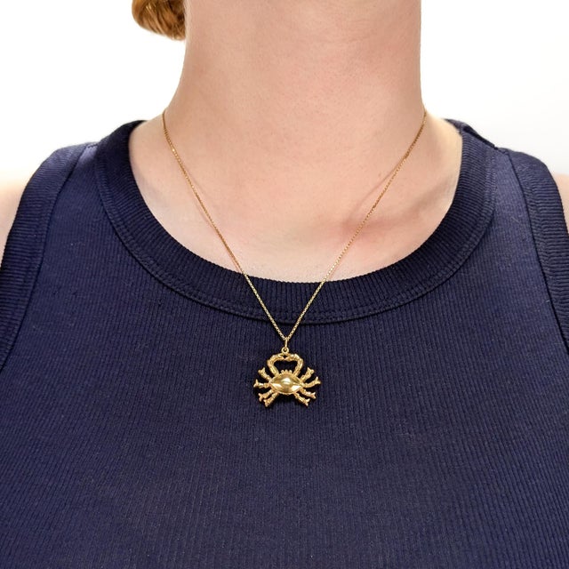 A fine vintage gold charm for a bracelet. In 14 karat yellow gold. In the form of a (possibly king) crab. With an integral...