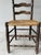 Pair of turned solid oak ladder chairs with straw seats. 1950s, with handcrafted charm. Note the beautiful woodwork,...