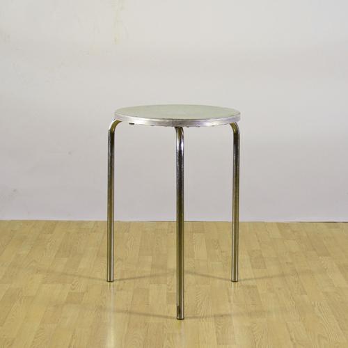 This vintage garden table is a classic example of 1950s industrial design, combining functional aesthetics with durable...