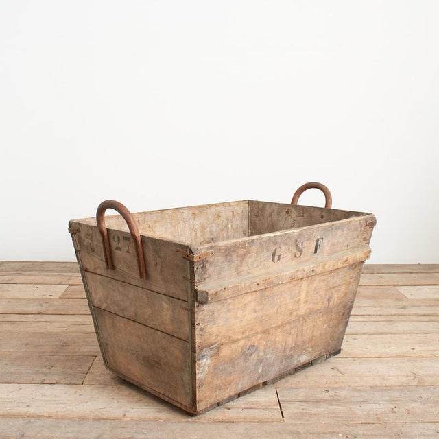 A grape harvest collection crate from a French vineyard in the Champagne region of France. The crates are solid wood with...