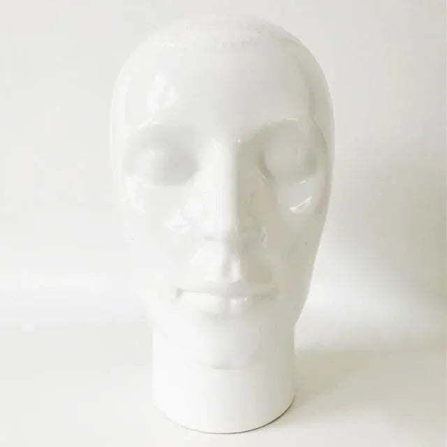 Vintage mid-century white glazed earthenware head from Royal Delft from the 1970s. These heads were used in the 1970s/80s...