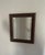 This ornately framed beveled glass mirror is from the 1960s or 1970s. Its frame is made of a heavy composite material that...