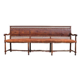 Early 20th Century Spanish Colonial Style Carved Wood and Tooled Leather Long Bench For Sale