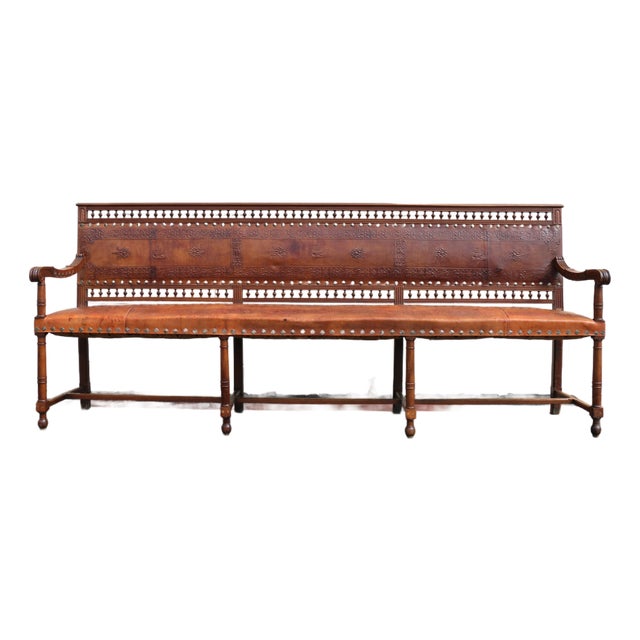 Early 20th Century Spanish Colonial Style Carved Wood and Tooled Leather Long Bench For Sale