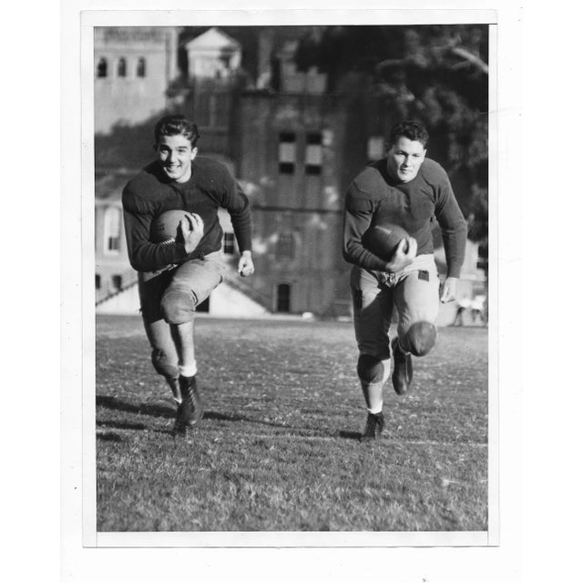 1933 black and white photo of USC quarterbacks "Mr. Trojan" Nick Pappas (1916-2015) and Glenn Thompson. Publication...