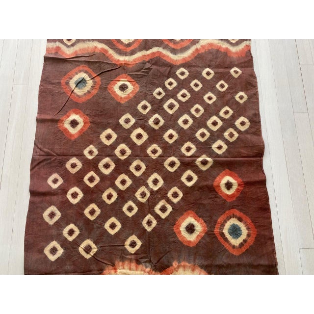 Striking ‘pelangi’ tie-dyed textile from Toraja Land, South Sulawesi. We added a linen border, double backed on both ends....