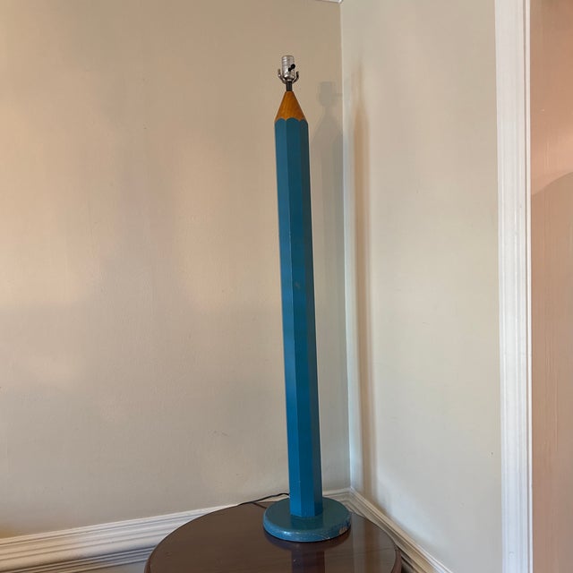 This vintage blue Lightolier pencil shaped floor lamp is fun and brings flair to any room. Likely from the 1970s, it has a...