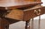 An English Georgian period oak side table from the early 19th century, with single drawer, turned legs and stretchers....
