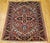"A truly exceptional and rare example of Persian weaving, this hand-knotted Heriz Serapi rug from the first quarter of the...