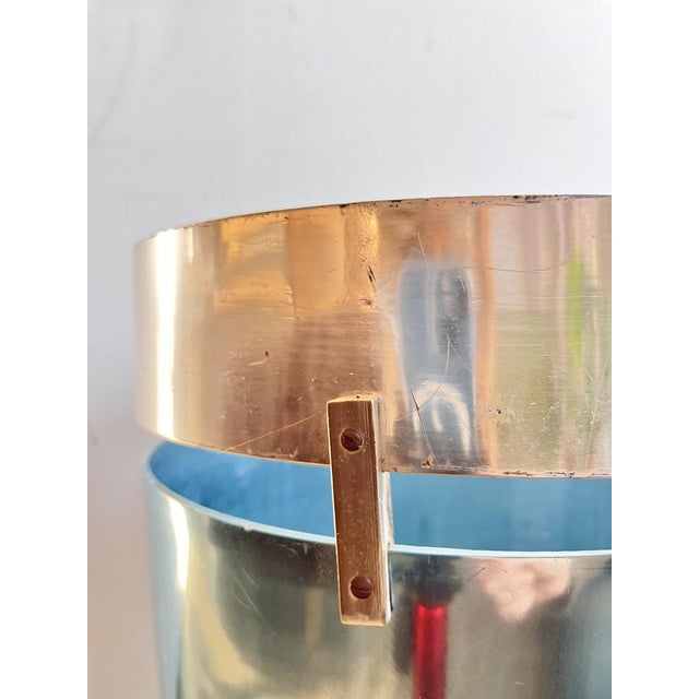 Anodized aluminum umbrella stand designed by Ettore Sottsass, a masterpiece of Italian design. Elegant, functional and...