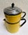 This vintage French coffee pot is a beautiful addition to any collection. The yellow graniteware gives it a charming...