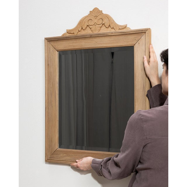 This mirror carries genuine presence, its natural oak frame with carved crest, dark glass immediately setting the tone for...