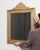 This mirror carries genuine presence, its natural oak frame with carved crest, dark glass immediately setting the tone for...