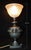 A distinctive french art deco table lamp dating to the 1930s, attributed to brandt and designed around a stylised...