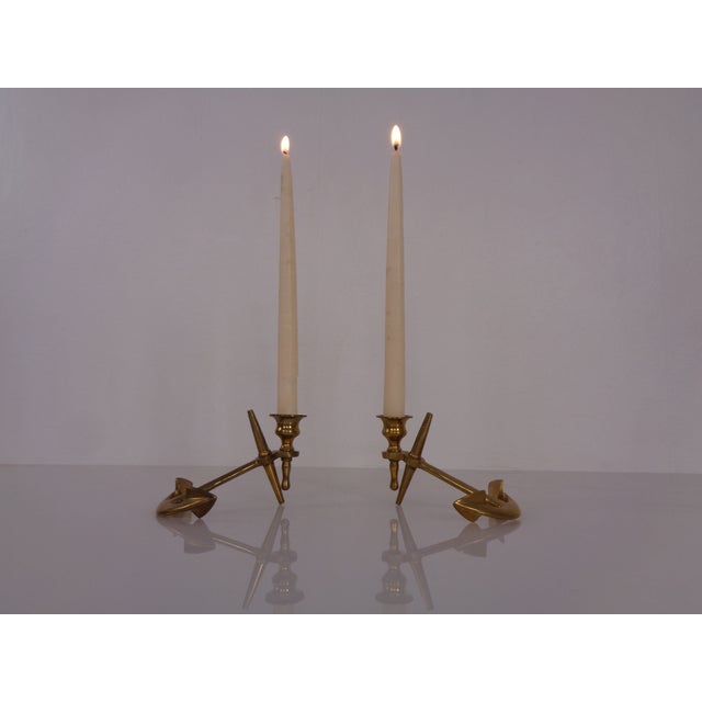 Pair of maritime brass candlesticks in the shape of an anchor from the 1960s.
