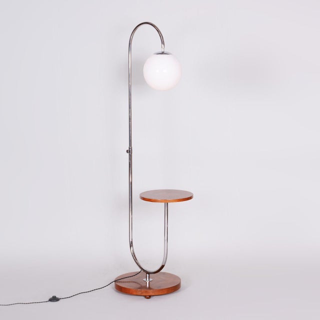 Adjustable height: 130 - 184 cm This piece is attributed to the mentioned designer/maker. It has no attribution mark and...