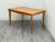 Mid century modern dining table manufactured by Heywood Wakefield includes one leaf extension, professionally restored.