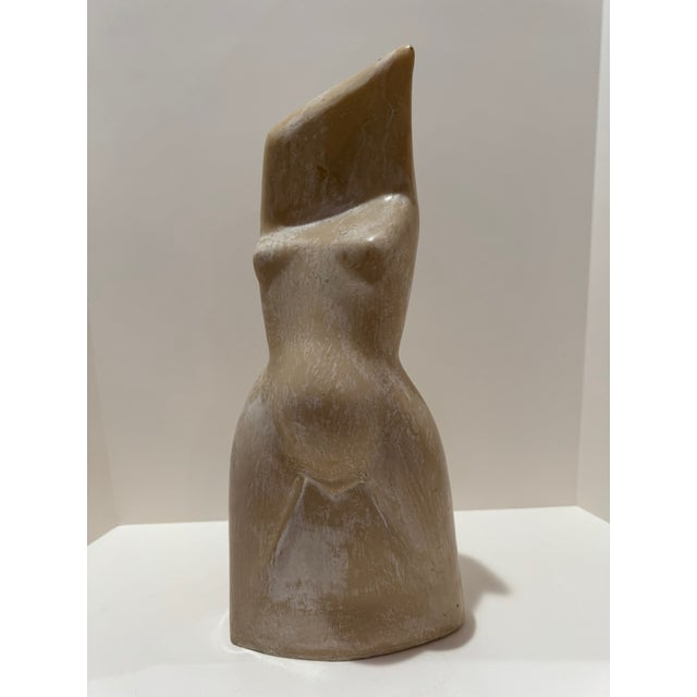 Original resin sculpture by Larry Mohr, acquired directly from the artist’s estate. This work presents a stylized female...