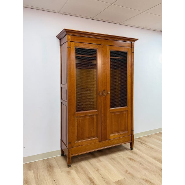 This impressive vintage Grange French antique style locking wardrobe is a beautifully crafted and highly collectible...