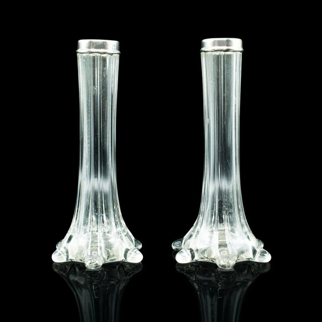 This is a pair of antique breakfast stem vases. An English, glass and silver collared posy vase, hallmarked to the late...
