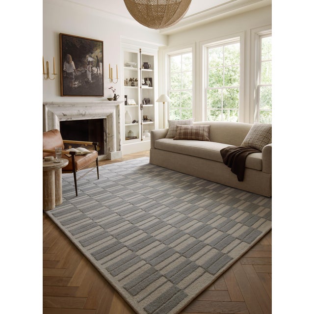 The Bradley Collection from Chris Loves Julia x Loloi takes the classic striped rug to new heights. This hand-tufted, 100%...