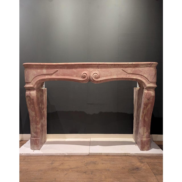 Antique French Fireplace Mantel - Rose de Bourgogne (c. 1680) This 17th-century Louis XIV mantelpiece is a rare specimen,...