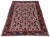 A wonderful antique Heriz rug, hand woven circa 1920 with an all over geometrical design on an unusual ivory field and...