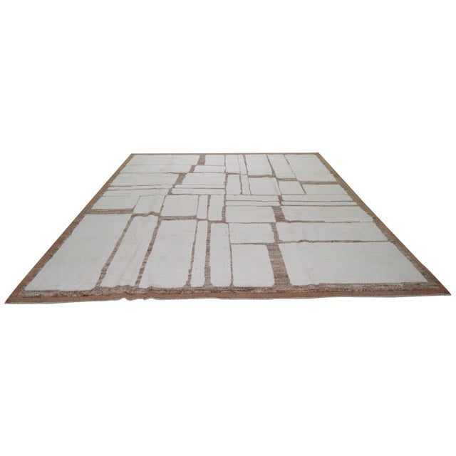 Moroccan Hand-knotted with care using traditional rug making techniques, this wool rug blends timeless craftsmanship with...