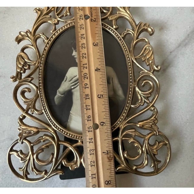 Victorian Ornate Vintage Victorian-Style Brass Oval Picture Frame With an Intricate Scrollwork Design and a Standing Easel Base. For Sale - Image 3 of 8
