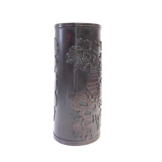 This is an oval shape oriental brush pot / pen holder / container made of bamboo with relief floral pattern carved on the...