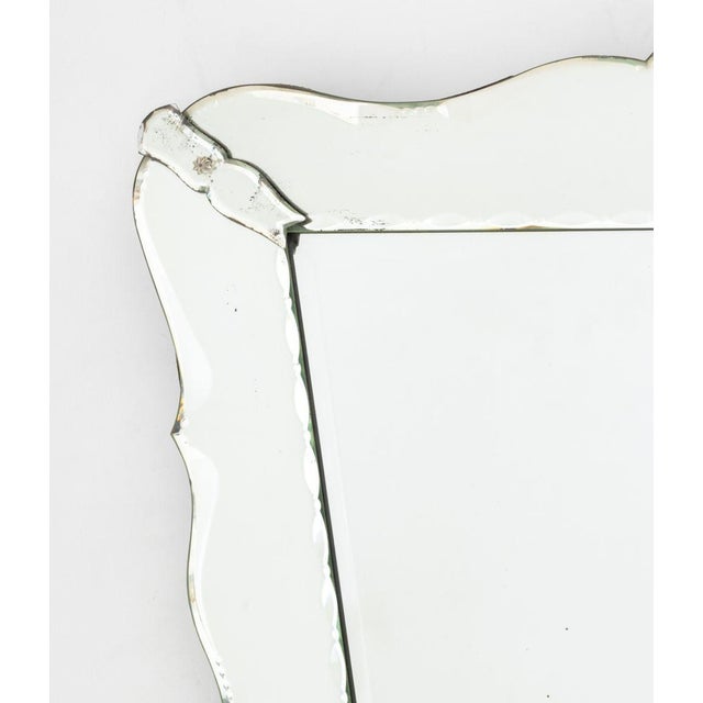 Venetian Style Mirror Framed Beveled Glass Mirror. Mirror plate: 27.5" H x 22.25" W; overall: 36" H x 30" W x 1.5" D....