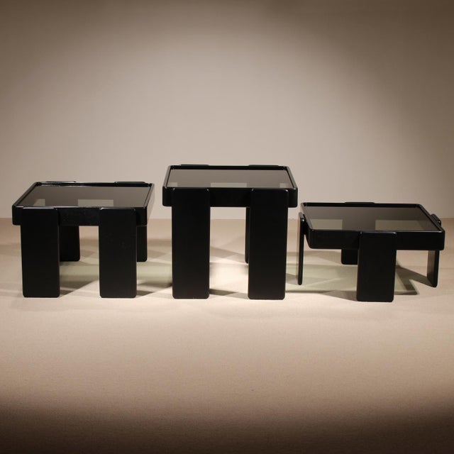 An iconic ensemble of three square nesting tables, designed by the Italian master architect Gianfranco Frattini for...